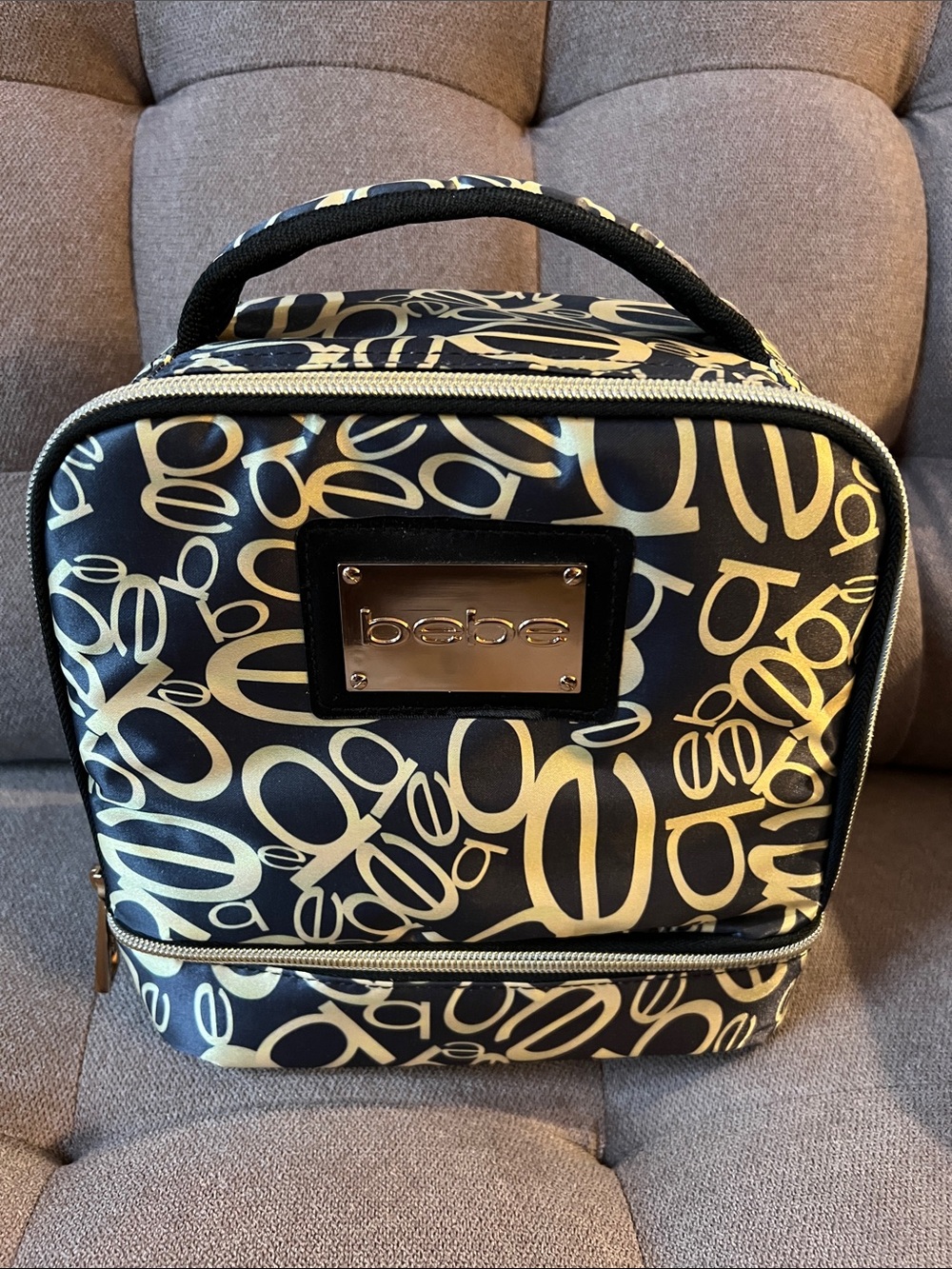 BEBE Black and Gold Logo Pattern Lunch Bag